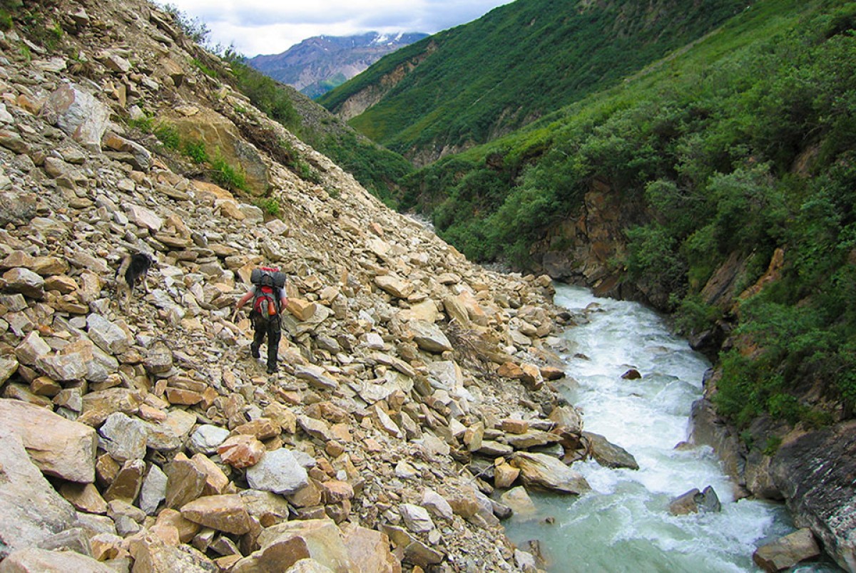 Backpacking through some scree along the Robertson/Johnson Route in the Eastern Alaska Range.