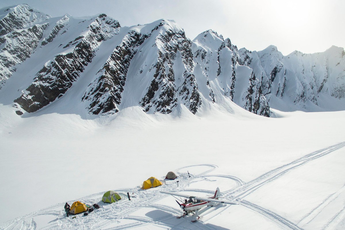 Checking out The Books ski camp with our plane, near Valdez.