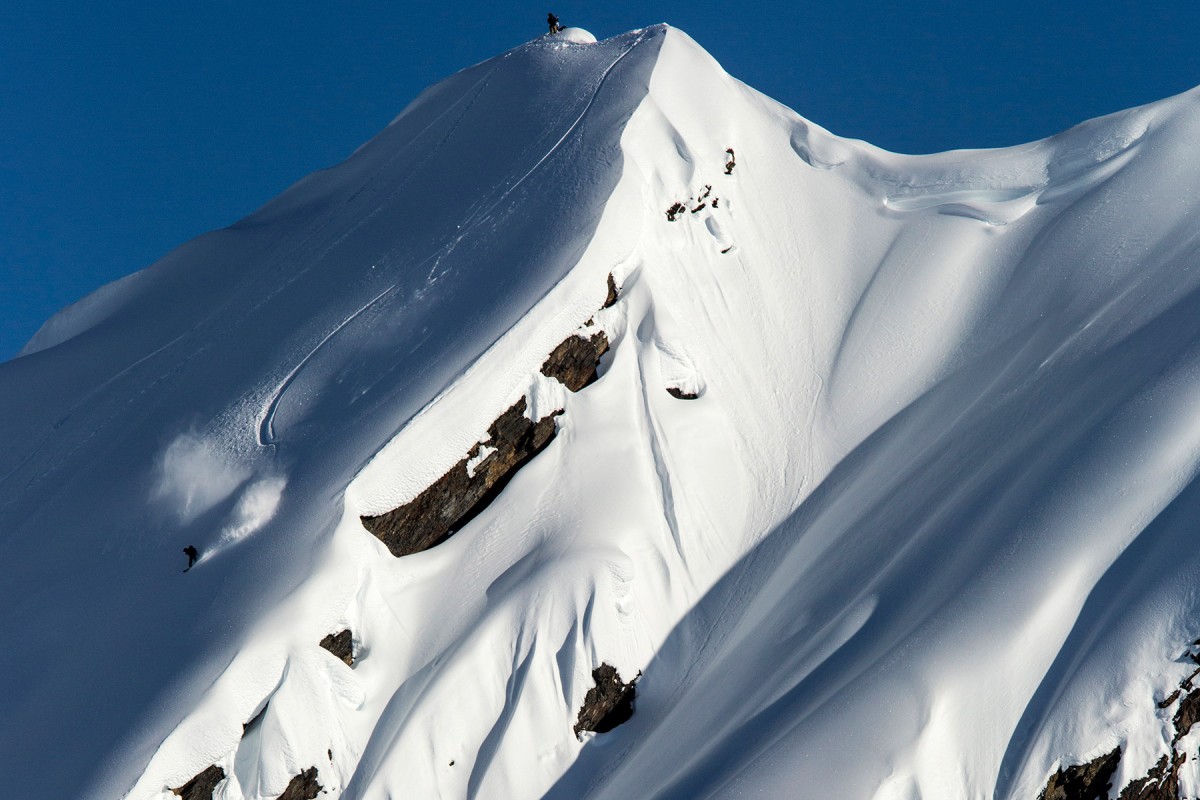 Carving big lines in The Goat Zone, in the Chugach Mountains outside Valdez. Great glacier ski camp location.