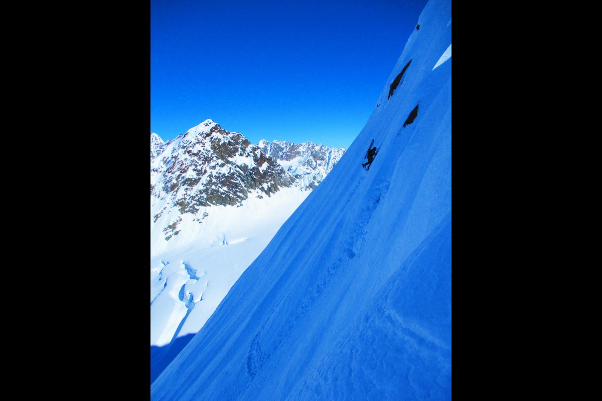 Making the steep approach on some of the more aggressive runs surrounding the Here He Comes glacier ski camp.