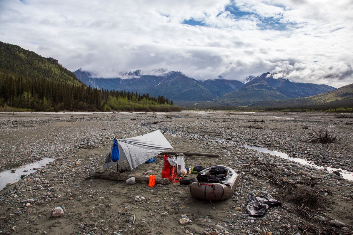 Camping on the shores of the Robertson River while packrafting out of the Eastern Alaska Range.