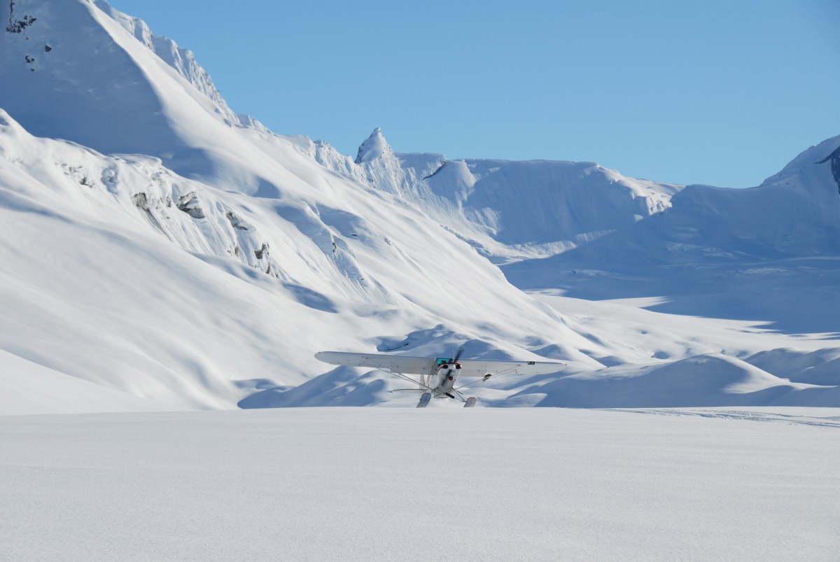 The ski plane taking off at Tasnuna Glacier, post a glacier ski camp drop off.