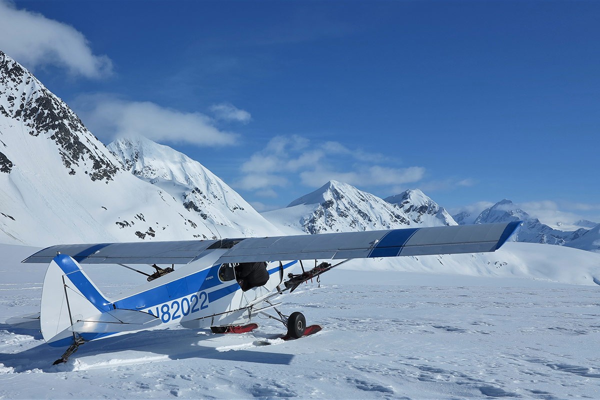 Setting the Super Cub ski plane down on Valdez Glacier.