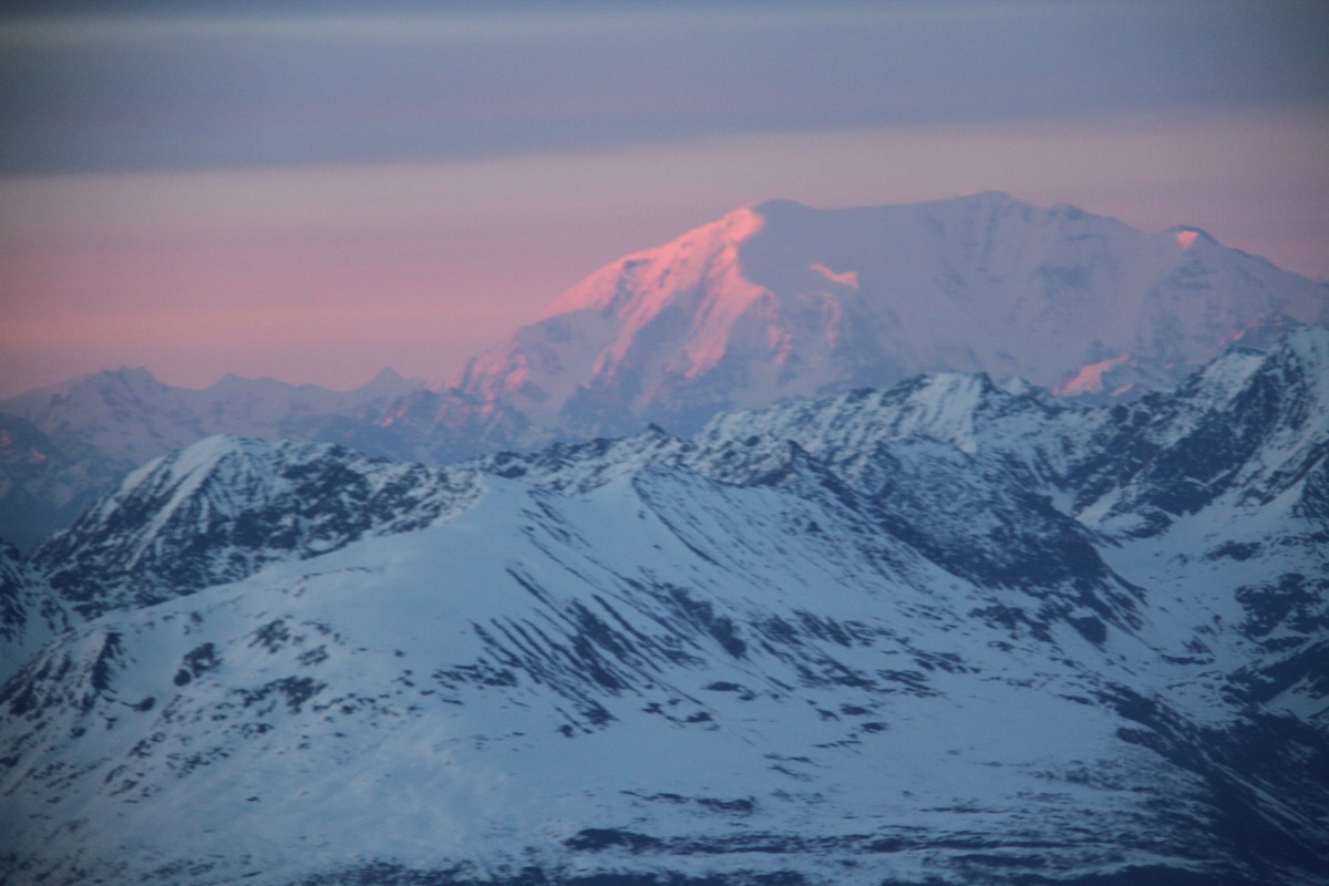 Looking out at the sunrise on Mt. Blackburn.